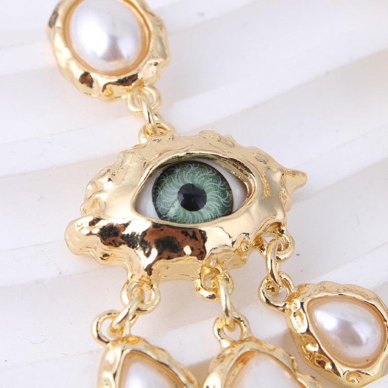 Exaggerated Big Eye With Pearl Charm Earring JLT12917