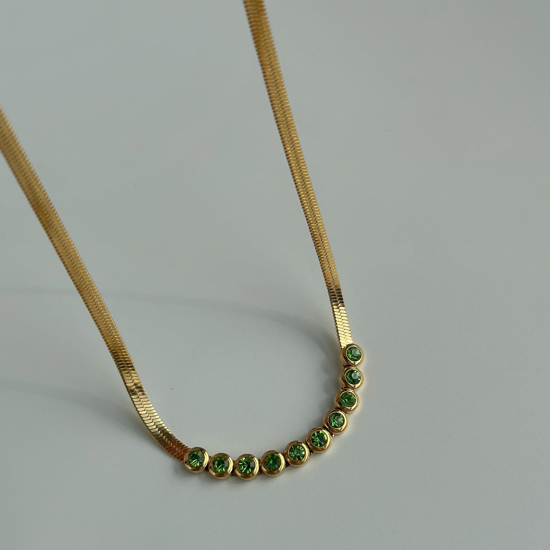 Sophisticated Gold Necklace with Sparkling Green Stones JLTN1333