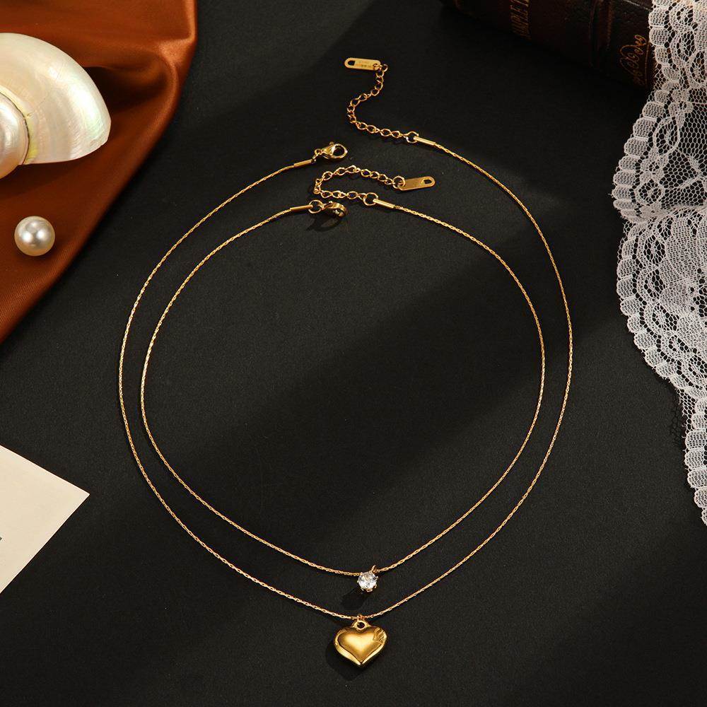 Dual-Layer Gold Necklace with Heart and Crystal Pendants JLTN1335